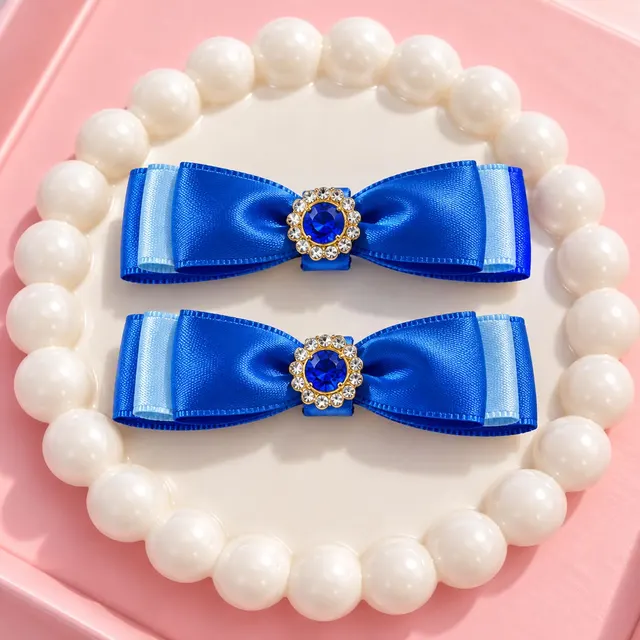 Royal Blue Luxe Bow Pair: Layered royal blue and sky blue ribbon bows with a deep blue jeweled centerpiece.